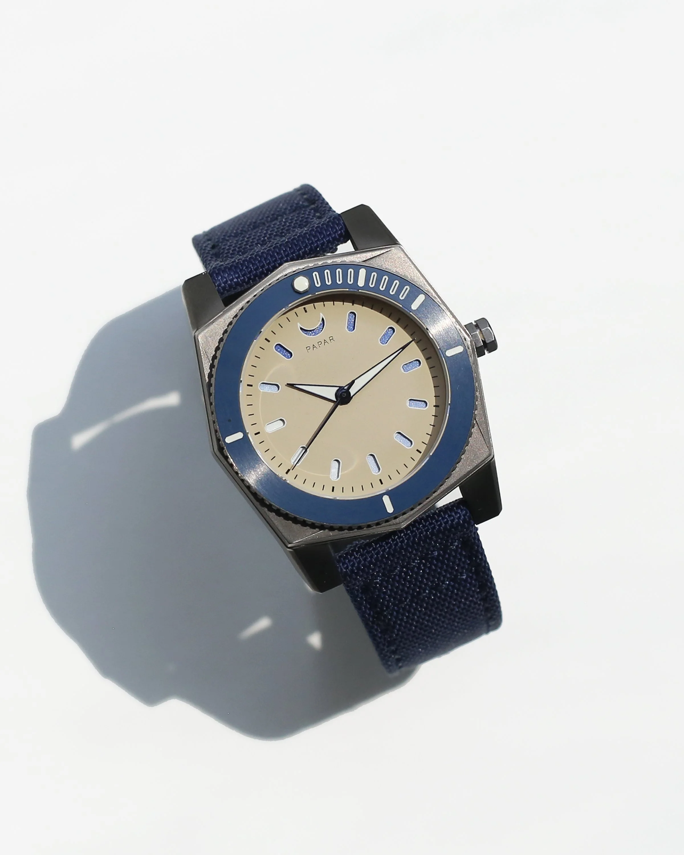 Titanium Papar Cenote Diver with a blue ceramic bezel and colour-shifting sandwich dial