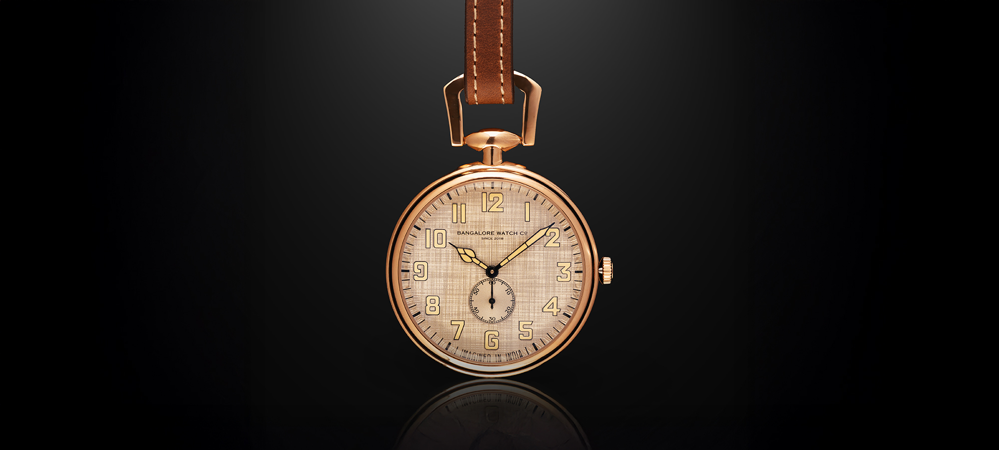 Bangalore Watch Company Forty-Seven rose-gold-tone pocket watch with an off-white linen-textured dial