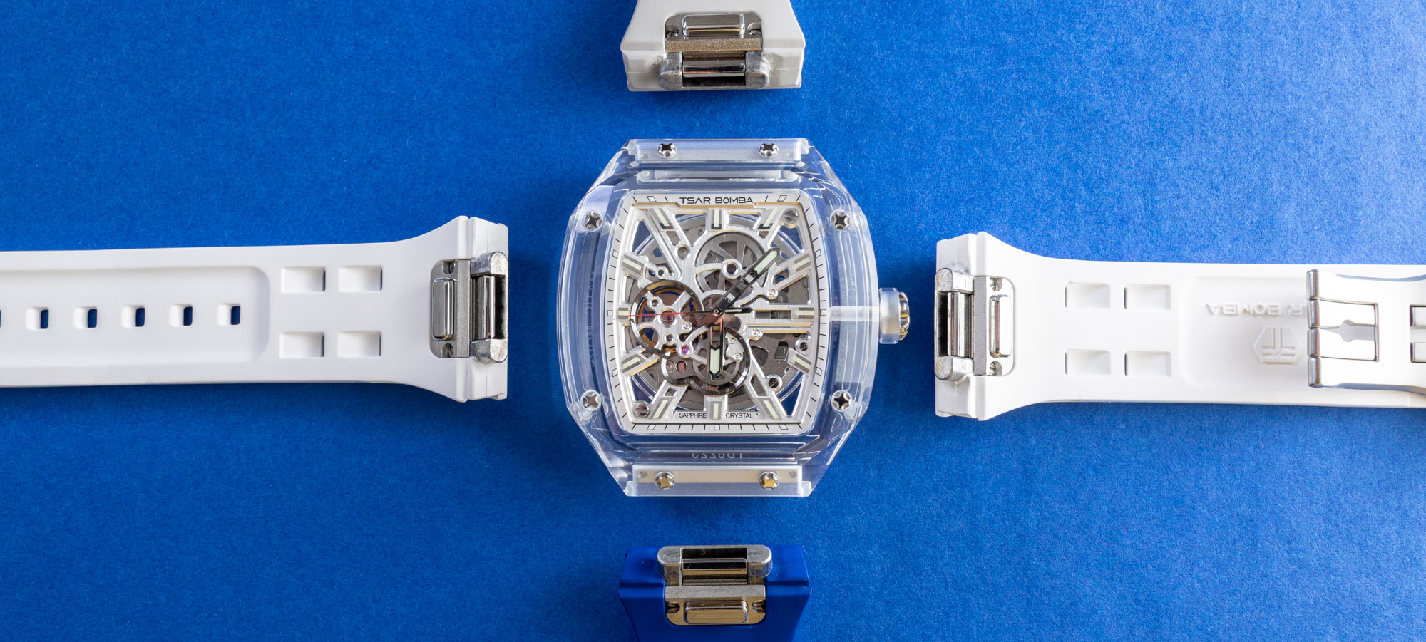 Transparent Tsar Bomba Light Matter tonneau watch showing its openworked dial and metal case screws