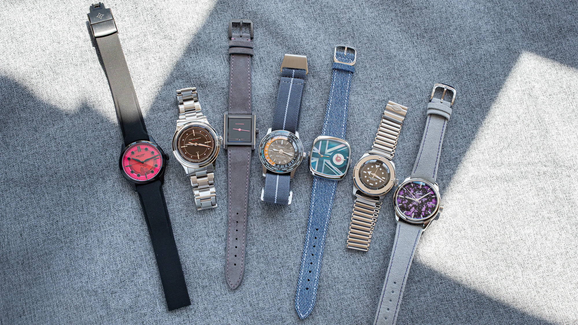 Seven FounderFest watches from independent brands arranged together