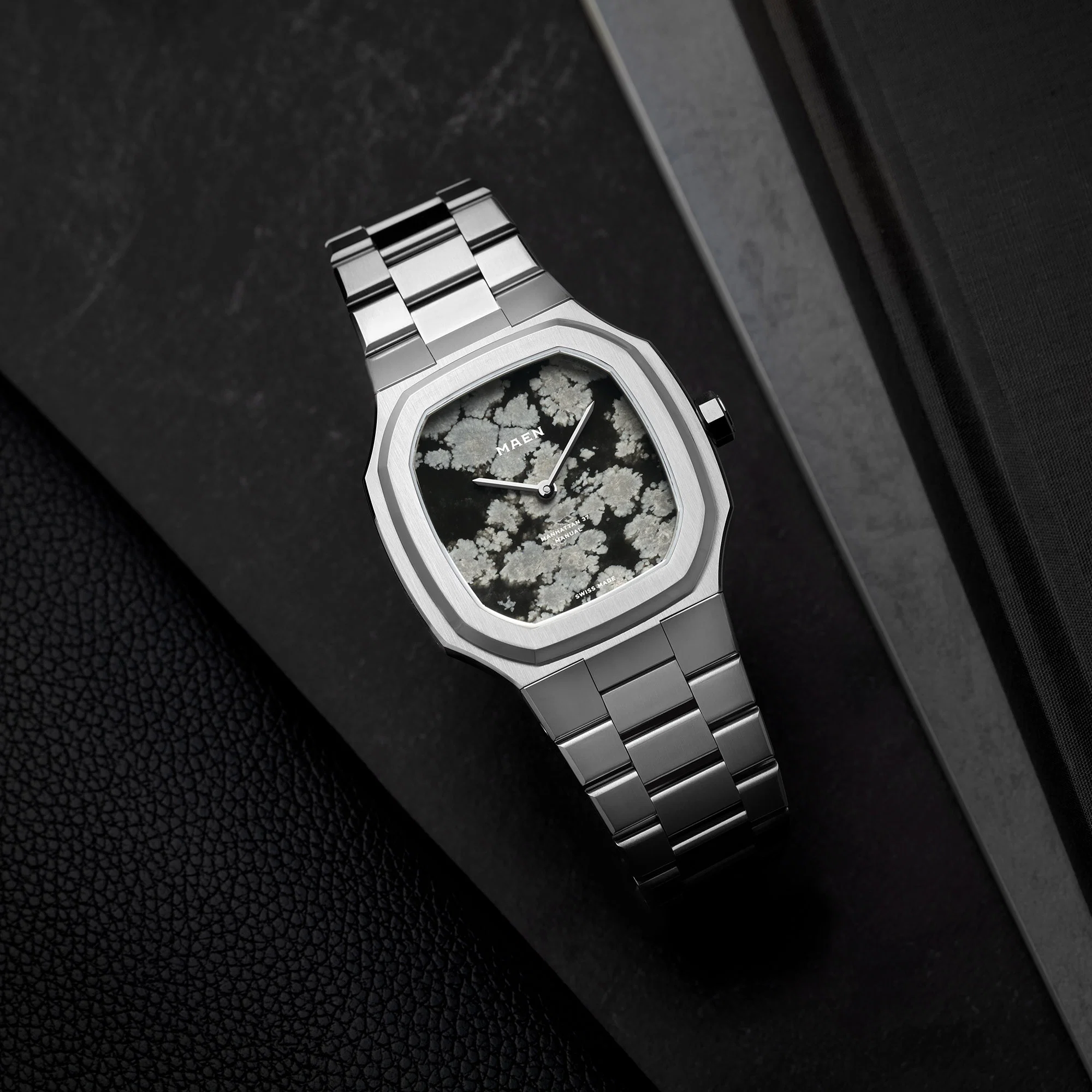 Close official view of the MAEN Snowflake Obsidian dial and integrated bracelet