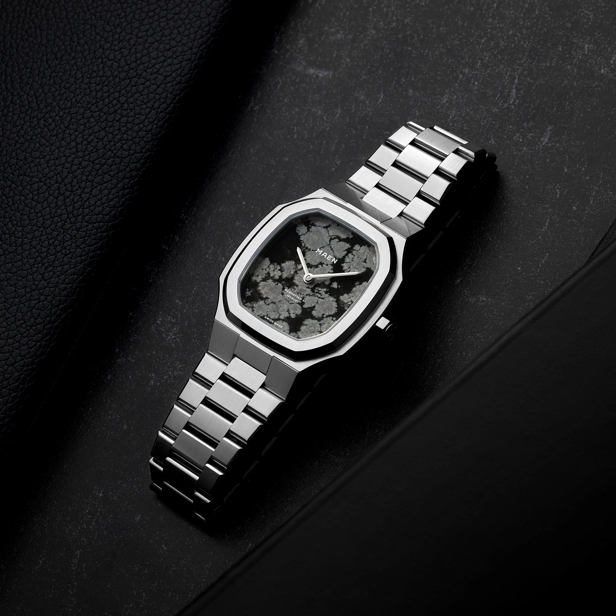 Angled official view of the MAEN Manhattan 37 Ultra Thin Snowflake Obsidian
